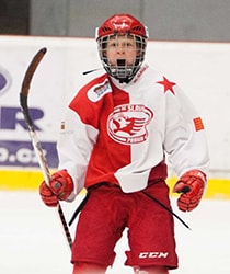 Kind freut sich beim Hockey Camp